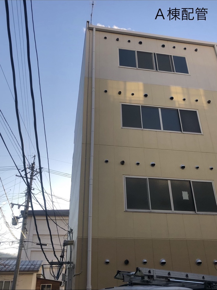 高所作業車を使用した集合住宅アンテナ工事